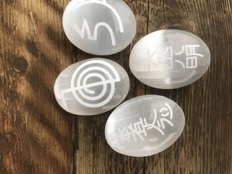 Reiki Symbols engraved onto Selenite palm stones