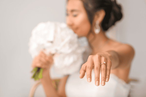 bride showing her wedding ring