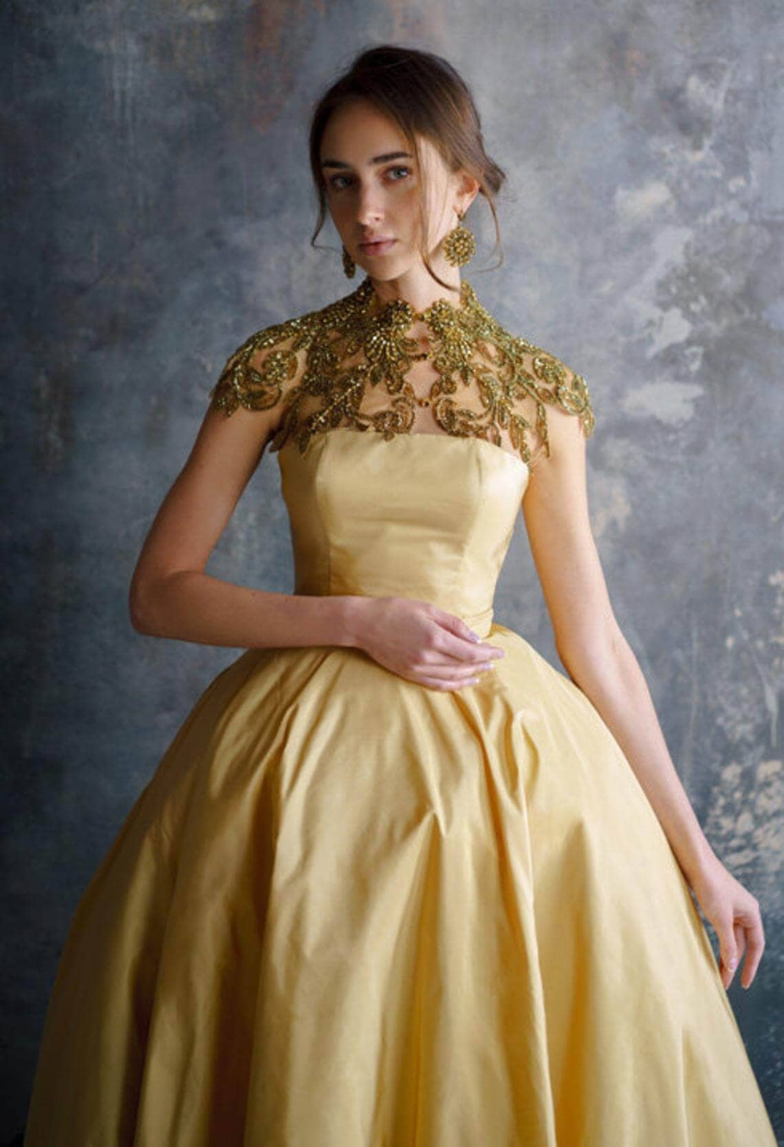 Girl wearing gold wedding dress