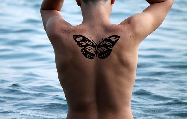 Butterfly tattoo man's back