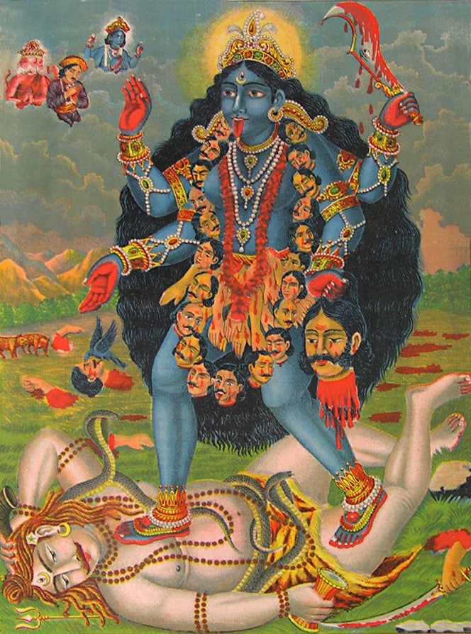Kali, draped with a necklace of skulls, stands on Shiva.