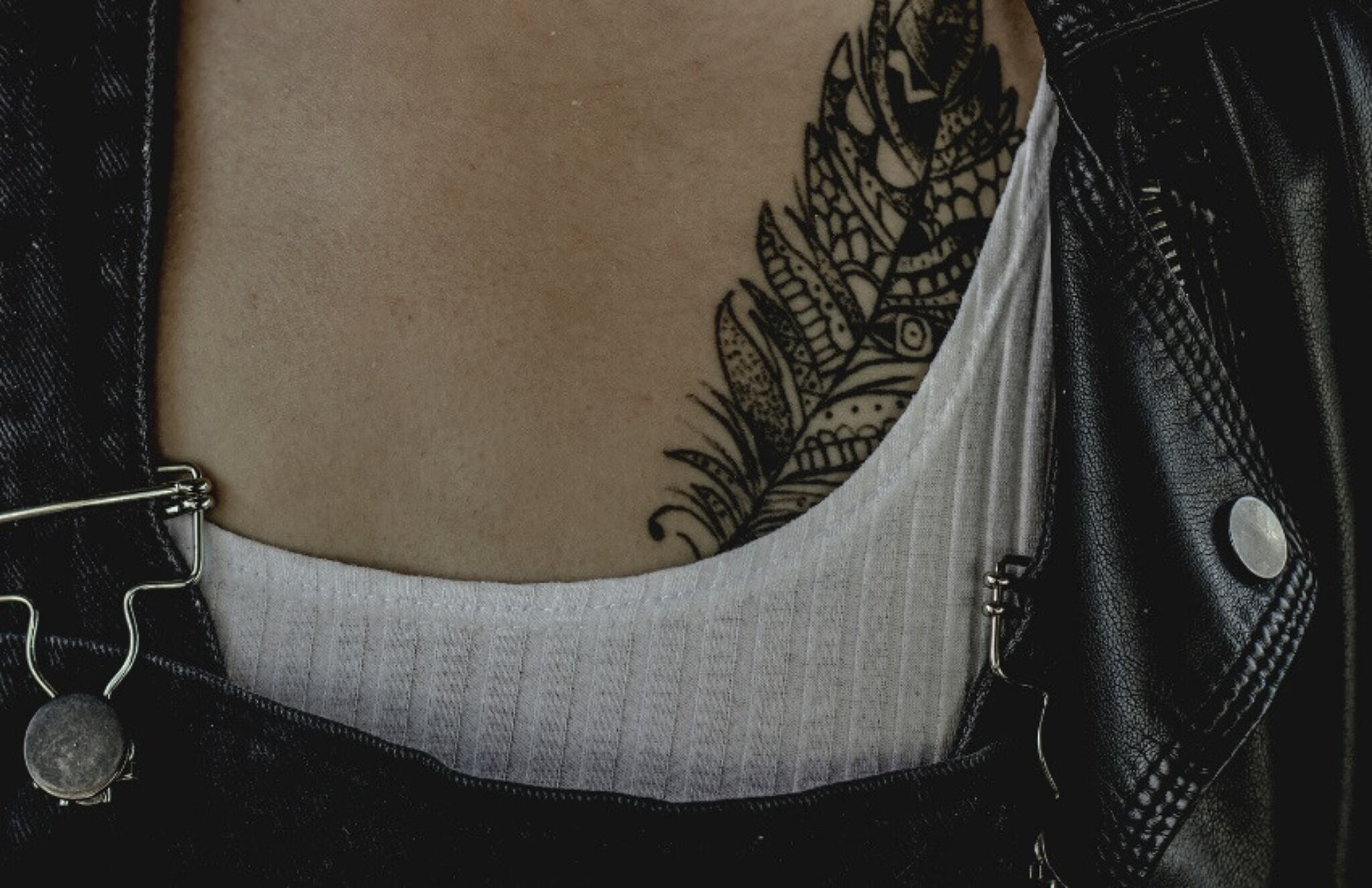 3. Feather Tattoo as a Symbol of Freedom - wide 2