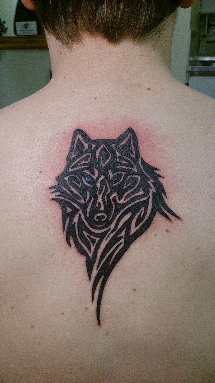 Geometric wolf tattoo