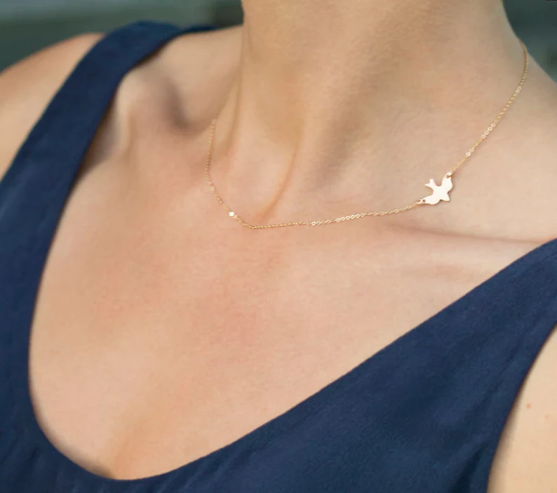Bird necklace symbol of freedom