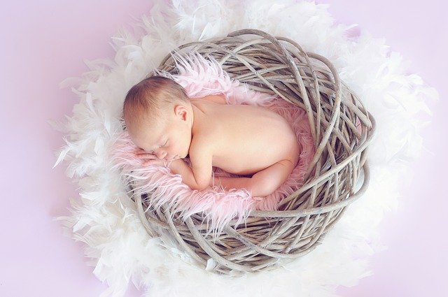 Baby girl in a basket