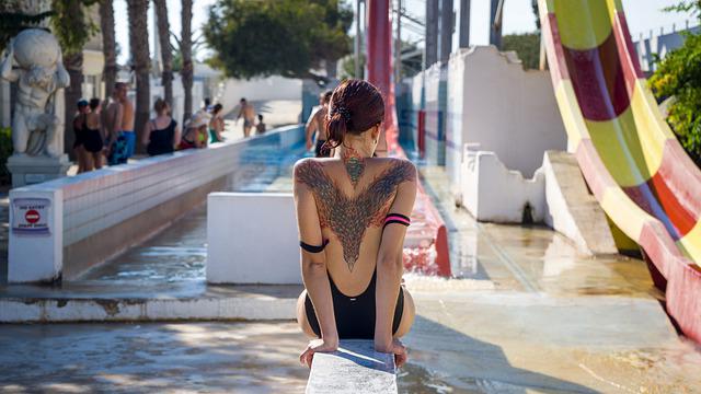 Girl with phoenix tattoo