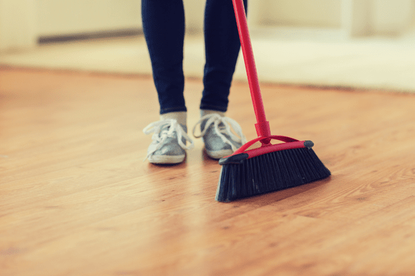 sweeping the floor