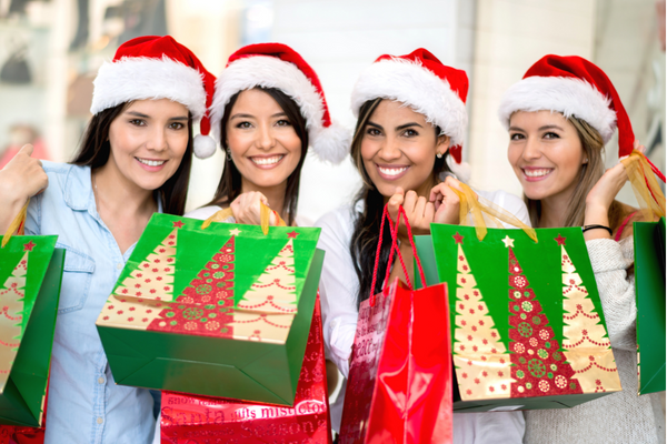 women with christmas gifts