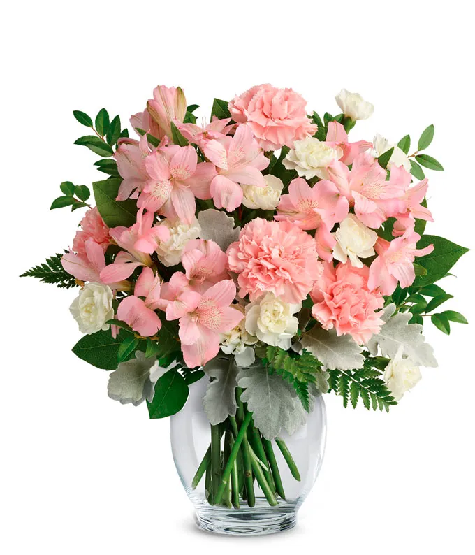 Floral arrangement with pink and white carnations