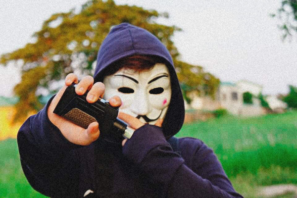 a man with guy fawkes mask