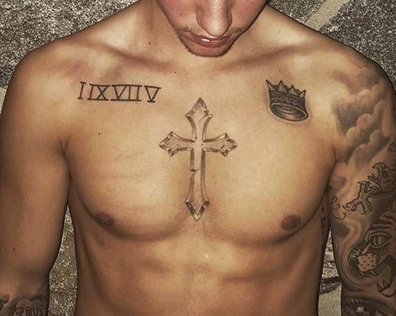 cross on the chest tattoo