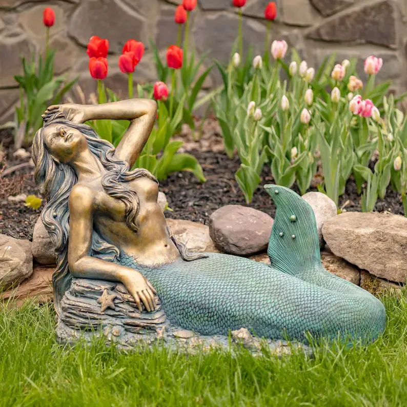 Reclining mermaid statue