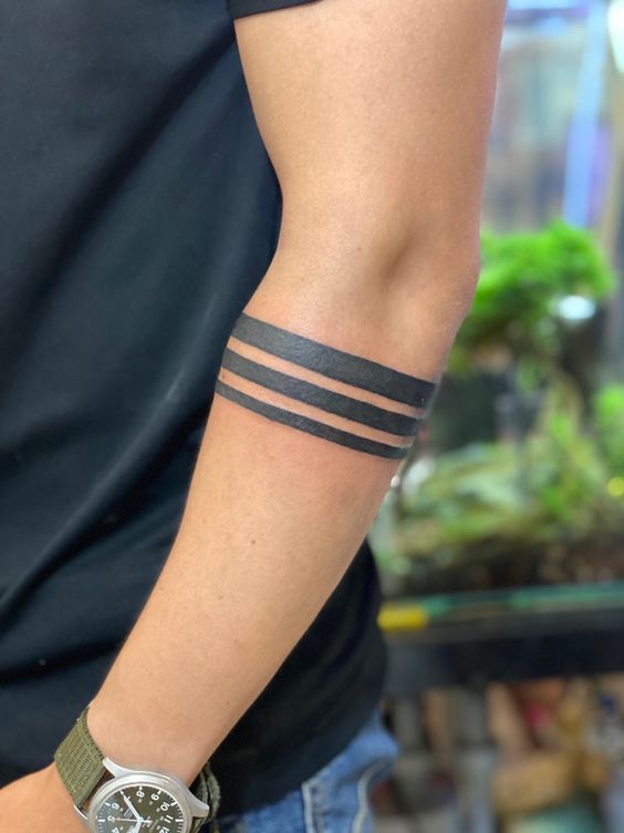 solid black armbands tattoo