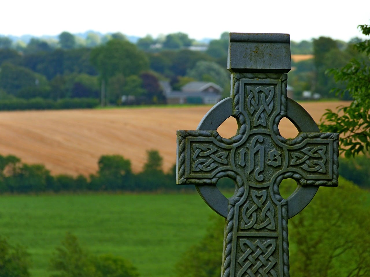 Celtic cross in a graveyard