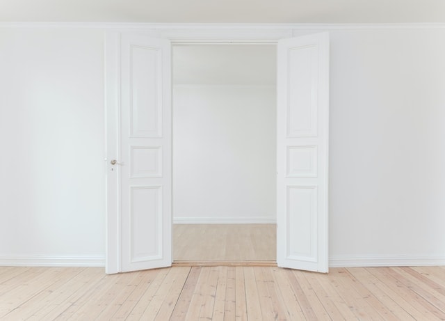 Open Door in a white room