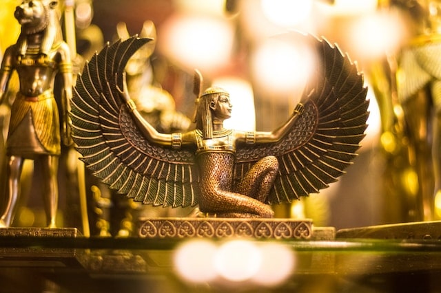 gold figurine goddess with wings
