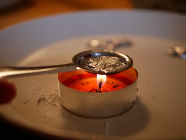melting lead metal using a candle