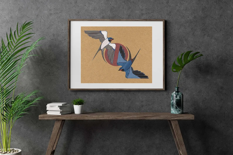 swallows and sun art print on the wall